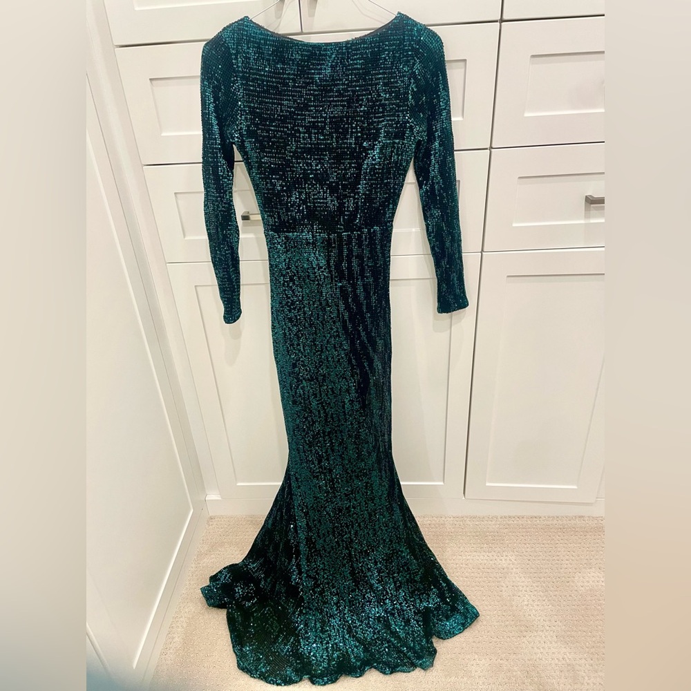 Green sequin long sleeve mermaid gown